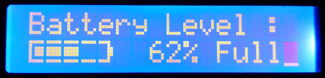 A 16x2 LCD module displaying some text and graphics